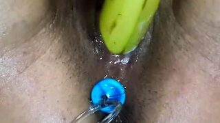 Amateur Milf Squirting fucking a Banana with Anal Beads