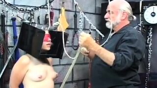 Woman screams with man smashing her muff in way-out bondage