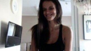 Amateur busty brunette masturbates and does hand job